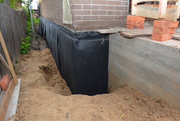 Happy homeowners after waterproofing job in Brentwood